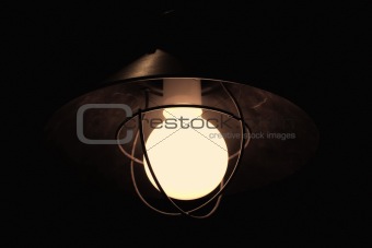 Ancient rusty street lantern in the dark