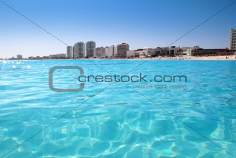 Cancun beach view from turquoise Caribbean