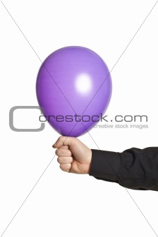 hand holding balloon