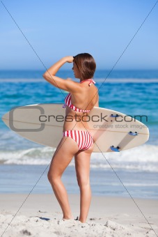 Woman with her surfboard