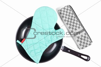 Kitchen glove in pan with grater