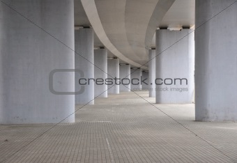 view on the road under concrete road bridge