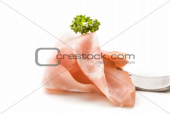 Fork with thin slice of mortadella