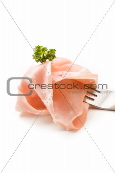 Fork with thin slice of mortadella