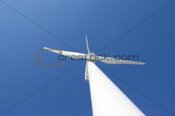 Windmill against blue sky