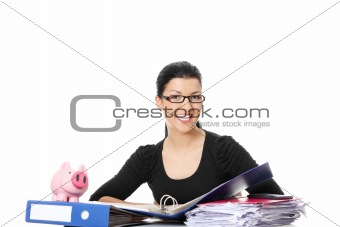 Smiling young woman sitting at the desk