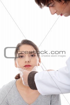 Plastic surgeons giving botox injection