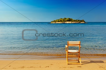 Chair on sandy beach