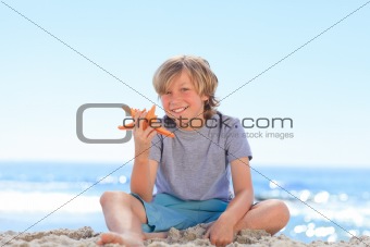 Little boy with a starfish