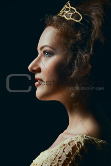 Profile of young woman on black background