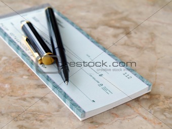 Cheque with pen.