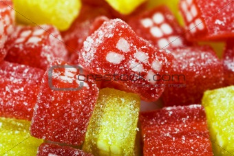background of delicious sweet candies in sugar