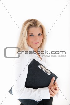 Beautiful business woman holding a folder
