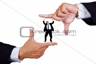 Young businessman making a hand frame isolated on white background