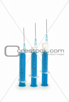 Three syringes isolated on the white background
