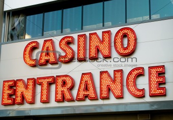 Casino entrance with big neon red letters