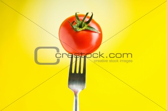 Red tomato against gradient background