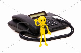 Phone support concept  - smilie and telephone isolated on white