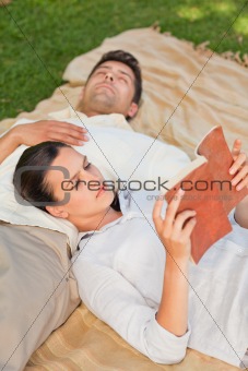 Couple reading in the park