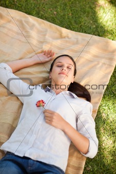 Woman sleeping with a rose