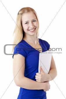Young female student with writting pad smiles happy