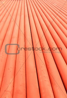 Stack of metallic pipes in a construction site 