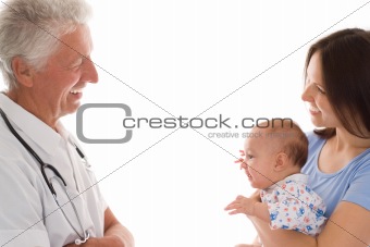 doctor and a woman with a newborn 