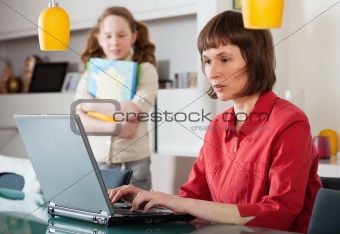 Mom and daughter with laptop