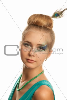 Smiling young woman in green dress.