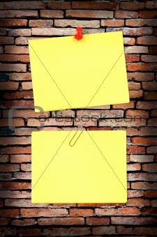 yellow note and old brick wall