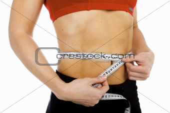 Woman measuring her body. Isolated over white background