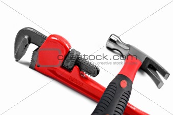 Hammer and wrench on a white background