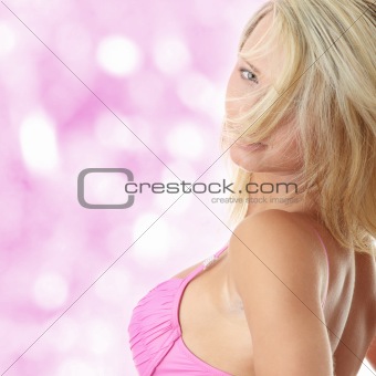 Beautiful model in pink bikini
