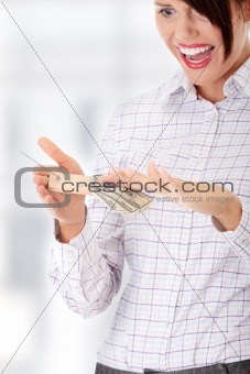 Businesswoman with finger in moustrap