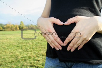 Heart From Hands, pregnant woman