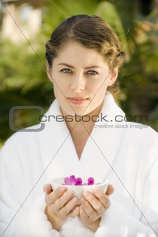 Woman holding bowl.