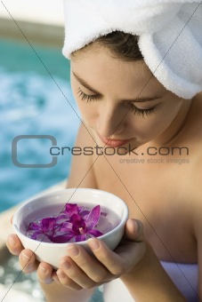 Woman holding bowl.
