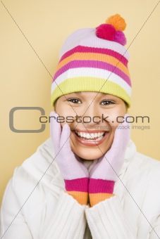 Woman in hat and gloves.