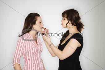 Makeup artist with woman.