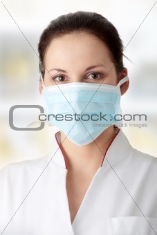 Young nurse in mask 