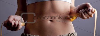 Beautiful and strong women's abs with metre. 