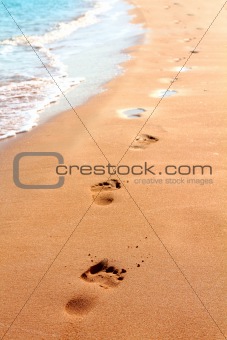 footprints on sand beach