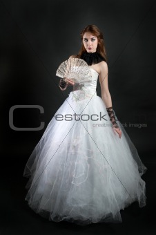 Girl with fan in white dress