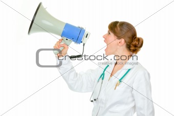 Frustrated medical doctor woman yelling through megaphone
