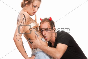 devil boy and  body-painted blonde woman