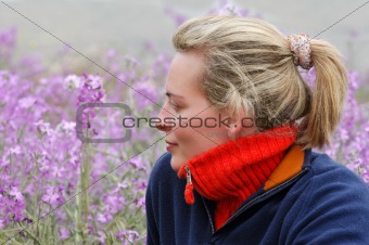 Beautiful young woman enjoying the countryside