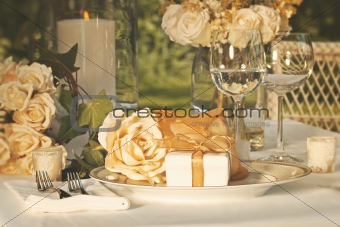 Wedding party favors on plate at reception