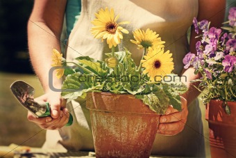 Woman doing garden work with vintage look
