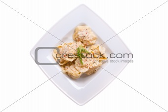 Dumplings in a white plate 