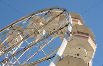 Retro Ferris Wheel Against Blue Sky